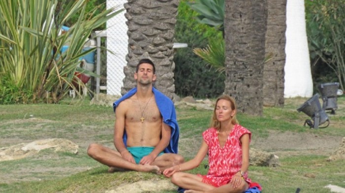 Novak Djokovic practicing yoga